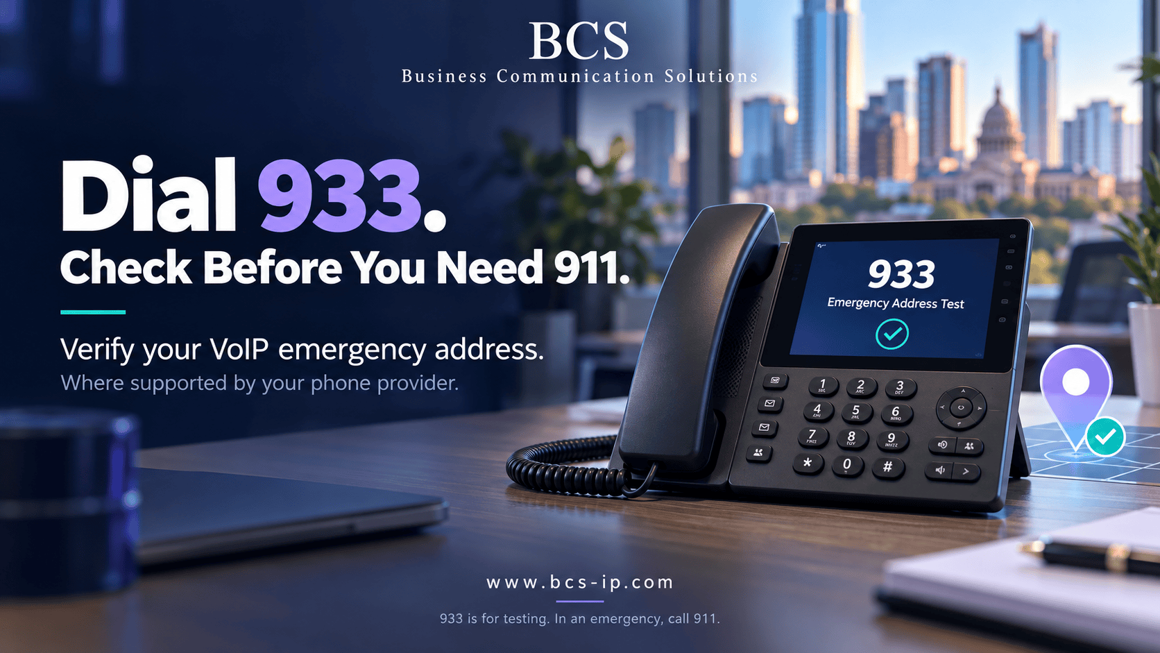 BCS VoIP desk phone displaying 933 with a reminder to verify the emergency address before needing 911.